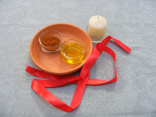 Hechizo con cinta roja